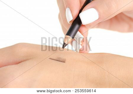 Black Eye Pencil In Hand On White Background Isolation