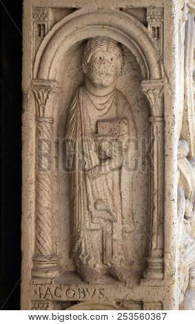MODENA, ITALY - JUNE 04: Saint James the Less the apostle, bass relief by followers of Wiligelmo, Princesâ Gate, Modena Cathedral, Italy on June 04, 2017.