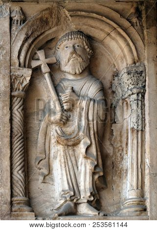 MODENA, ITALY - JUNE 04: Saint Paul the apostle, bass relief by followers of Wiligelmo, Princesâ Gate, Modena Cathedral, Italy on June 04, 2017.