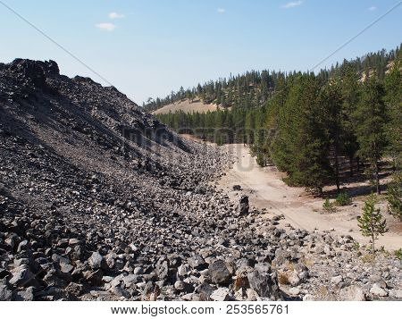 Textured Obsidian And Hardened Lava Rock On A Sunny Fall Day At The Big Obsidian Flow In The Newberr