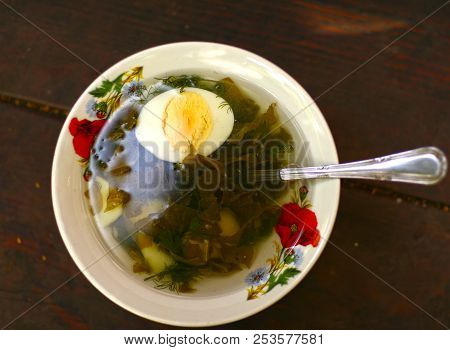 Cold Summer Russian Sorrel Shchi Soup Close Up Photo On Wooden Table Background