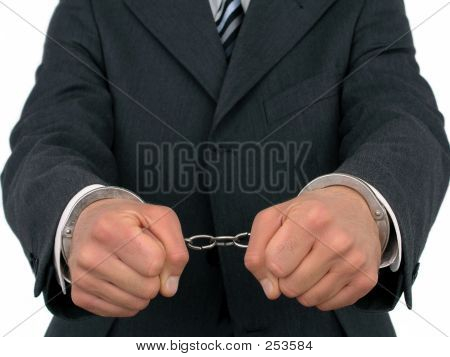 Forretningsmand iført håndjern