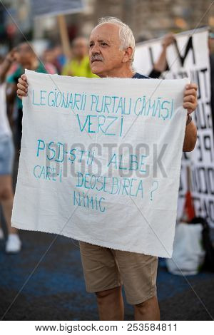 Romania, Bucharest - August 12, 2018: Old Man Protesting Peacefully