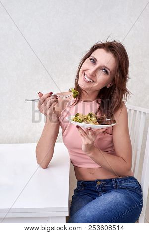 Beautiful Young Woman Eating Seaweed Salad. Dieting Concept. Healthy Food