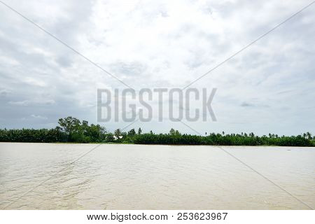 Bang Pakong River With Sky, Cloud And Tree At Chachoengsao In Thailand, Space For Your Text