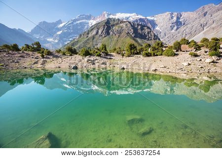 Beautiful serene lake in  Fann mountains (branch of Pamir) in Tajikistan.