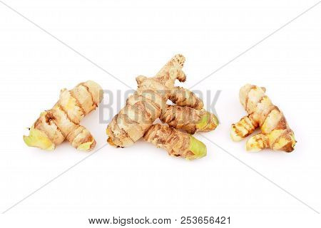 Fresh Turmeric On A White Background. Herbal