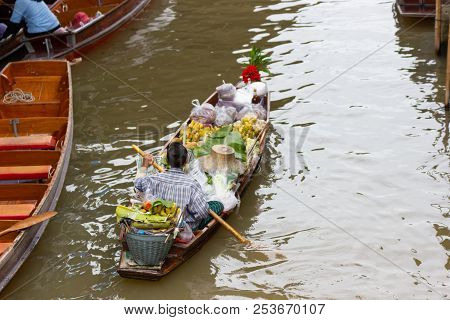 Damnoen Saduak Floating Market, Thailand Small Boats Laden With Colourful Fruits And Vegetables And 