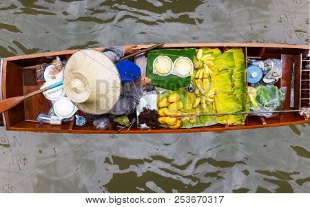 Damnoen Saduak Floating Market, Thailand Small Boats Laden With Colourful Fruits And Vegetables And 