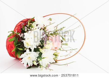 Beautiful Fresh Bouquet In Red Basket On White Background