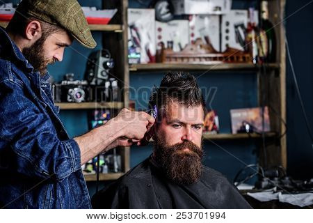 Barber With Clipper Trimming Hair On Temple Of Client. Hipster Lifestyle Concept. Hipster Client Get