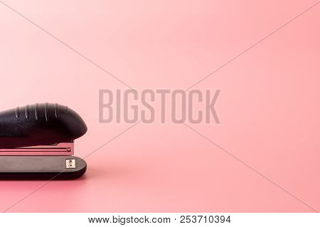 Stapler And Tape On Pink Background Back To School Education With Copy Space