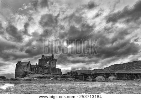 Eilean Donan Castle At Dornie On Kyle Of Lochalsh In Scotland With Clouds And Artistic Conversion