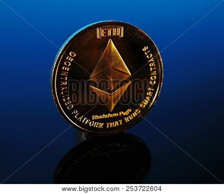 Etherum Money Crypto Currency Coin On Reflective Colorful Background