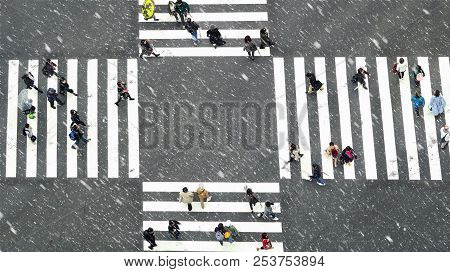 Tokyo, Japan - October 2017 : Top View Of Undefined Japanese People Crowd Are Walking To Crosses The