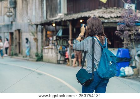 Backside Of Asian Traveler Taking The Photo In Mae Kam Pong Village, Chiang Mai, Thailand, Travel An
