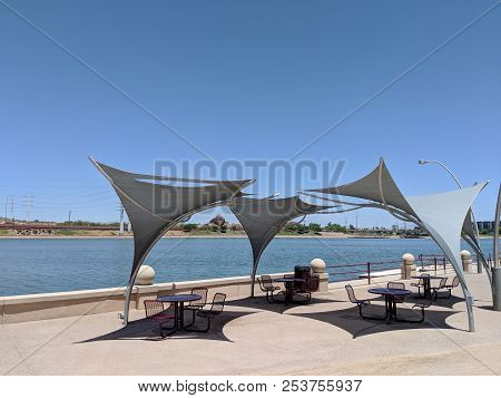 Awnings Shielding Recreation Area From Merciless Hot Sun At Salt River Lakeside In Tempe, Arizona; C