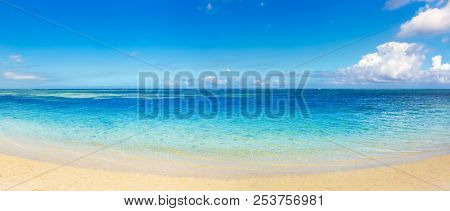 Sandy tropical Wolmar beach at sunny day. Beautiful landscape. Panorama. Mauritius