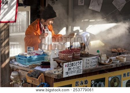 Beppu, Japan - December 29, 2009: Woman Vendor Cooking Boiled Eggs, Popular Street Food In Beppu.