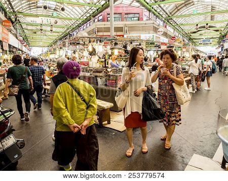 Seoul, South Korea - June 21, 2017: People Shopping Tasty Food And Drink At Gwangjang Market In Seou