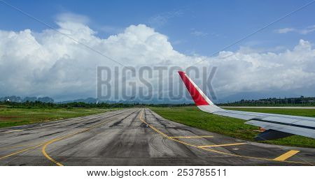 Airport Runway With Airplane Wing