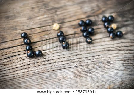 Berry Font. Word Life From Berries On A Wooden Background