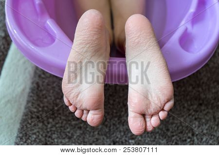 Child Girl Feet Sticking Out Of The Bathtub