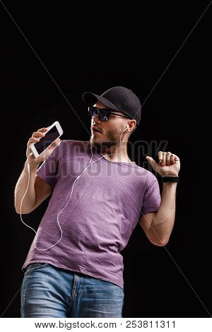The Man Listening To Music In Headphones