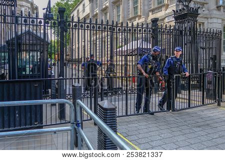 Downing Street, London, Uk - June 8, 2018: Armed Police Protecting The Entrance To Downing Street.  