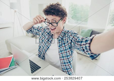 Handsome Curly-haired Excited Young Guy Student At Home, Wearing Casual, Glasses, Studying Learning 