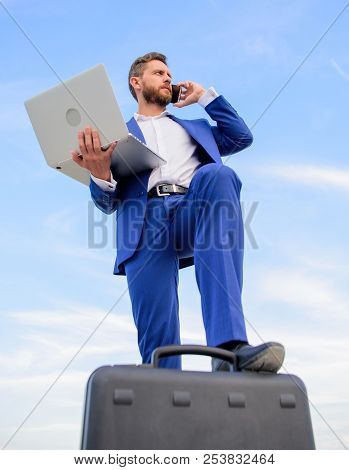 Man Well Groomed Businessman Holds Laptop Blue Sky Background. Guy Formal Suit Modern Technology Man