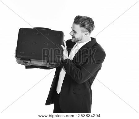 Man Carries Black Case In Hands. Businessman Looking At Briefcas
