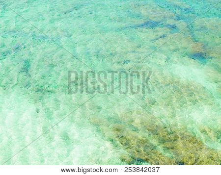 Picture Of Tropical Atlantic Ocean Water Background. Transparent Water And Bottom Of The Ocean. Natu