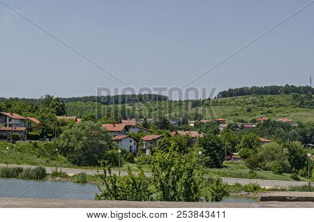 Springtime Green Forest, Glade, Reed Or Rush And House On A Beauty  Lake In Residential District Mar