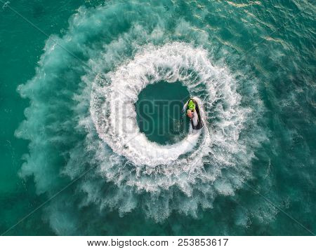 People Are Playing Jet Ski At Sea During The Holidays. Aerial View And Top View.