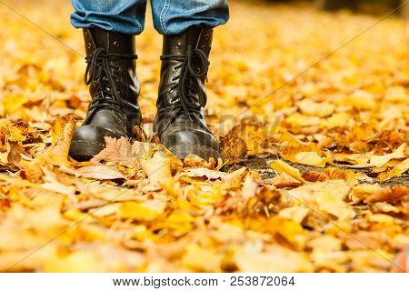 Nature Outdoor Foliage Relax Concept. Man In Black Boots.  Male In Leather Footwear Jeans Trousers S