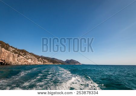 Panoramic View Of Golf Of Orosei And Cala Gonone On The Italian Island Of Sardinia From Seaside With
