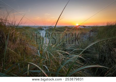 Sunset In The Dunes Of North Sea Beach In St. Peter-ording, Germany