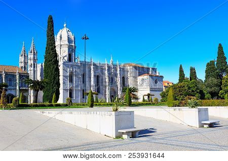 Lisbon, Portugal Park And View To Jeronimos Monastery Or Hieronymites Monastery, Famous Landmark