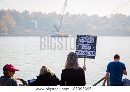 North Vancouver, Bc, Canada - Oct 28, 2017: Woman Holding A Sign In Protest Of The Proposed Kinder M