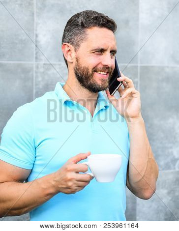 Man Drink Cappuccino Speak Phone Grey Wall Background. Coffee Can Be Endlessly Reimagined Make Somet