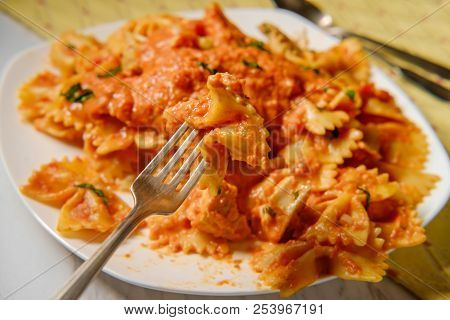 Farfalle Bow Tie Pasta In Creamy Vodka Tomato Sauce With Grilled Chicken And Green Peas