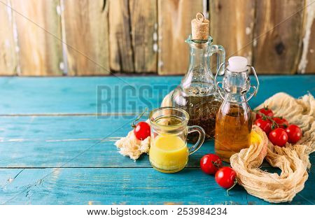Variety Of Homemade Sauces And Salad Dressings In Jars Including Oil, Vinegar, Mustard Dressing For 