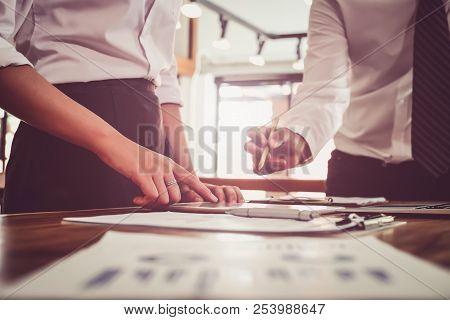 Close Up Asian Business Woman Using A Calculator To Calculate The Numbers.business Finances And Acco