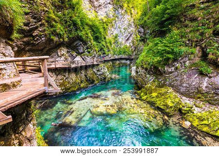 Vintgar Gorge, Slovenia. The Radovna River With Wooden Paths And Bridge Above. Beautiful Water River