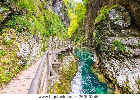 Vintgar Gorge, Slovenia. The Radovna River With Wooden Paths And Bridge Above. Beautiful Water River