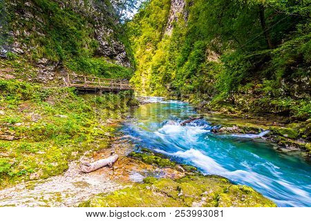 Vintgar Gorge, Slovenia. The Radovna River With Wooden Paths And Bridge Above. Beautiful Water River