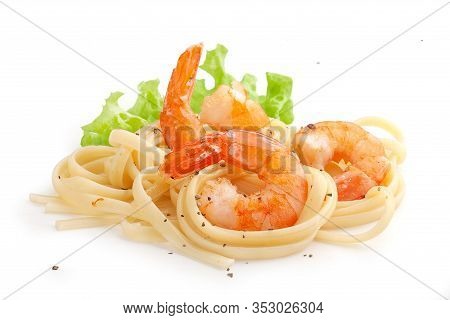 Handful Of Fried Shrimps With Pasta And Fresh Lettuce