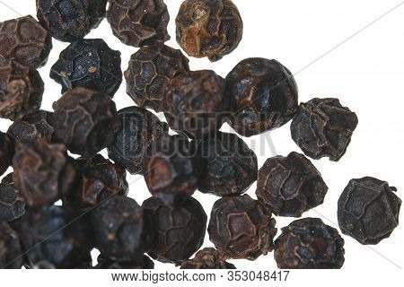 Black Penja Pepper (piper Nigrum) On A White Background. It Is The First African Product Obtaining T
