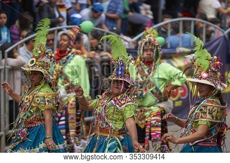 Oruro, Bolivia - February 26, 2017: Tinkus Dance Group In Ornate Costumes Performing As They Parade 